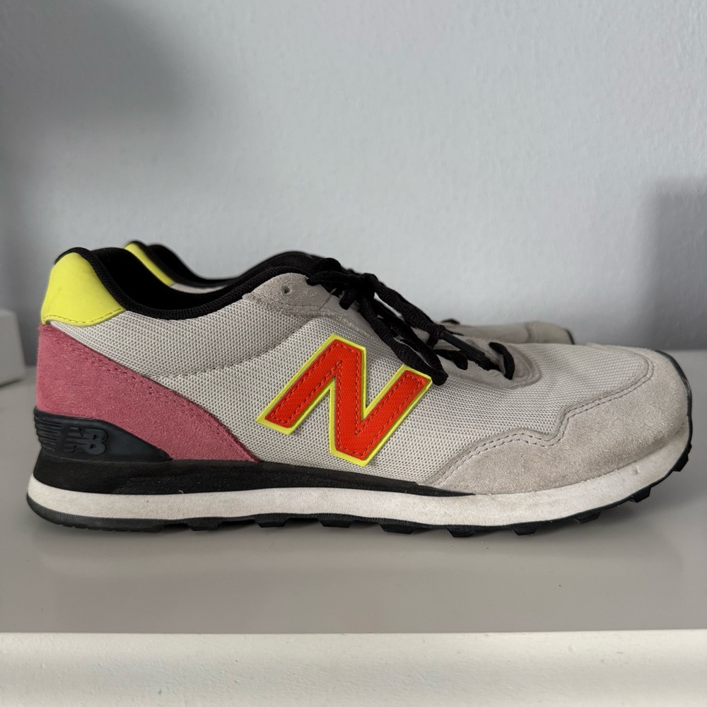 New Balance Gray Sneakers with Orange, Pink, and Yellow Accents